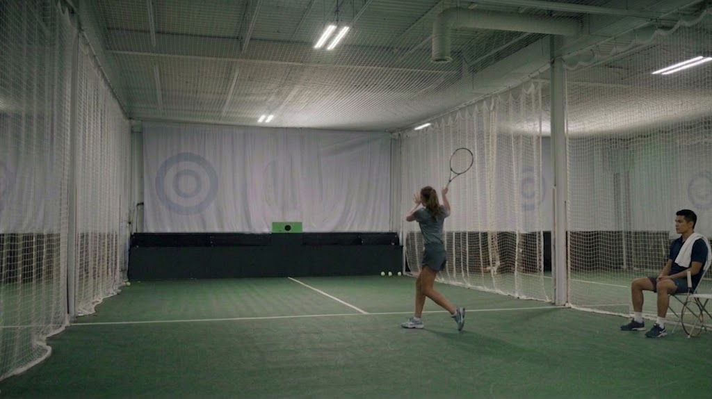 Private Tempo Tennis Lab court with target wall and ball machine
